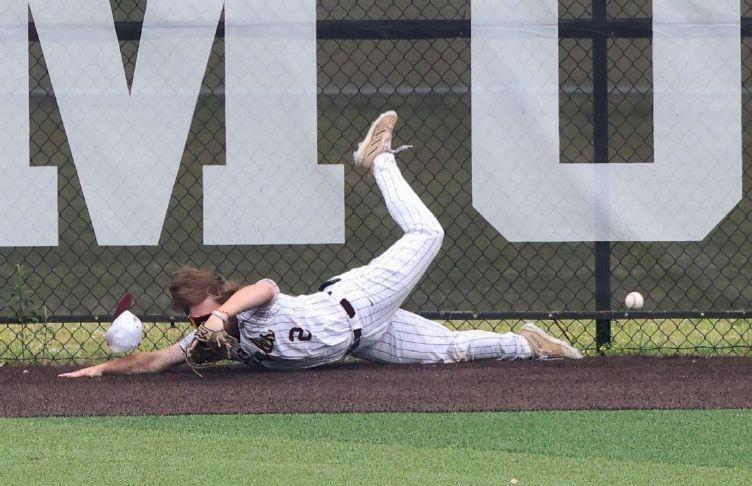bruce bishop  chronicle new albany right fielder quinn blaney cant hang onto the ball despite a valiant effort on a first-inning blast by amhersts landon wolf that ended up an inside-the-park homer during the division ii state semifinal friday june 13 2025 in canton amherst won 3-2 in 10 innings
